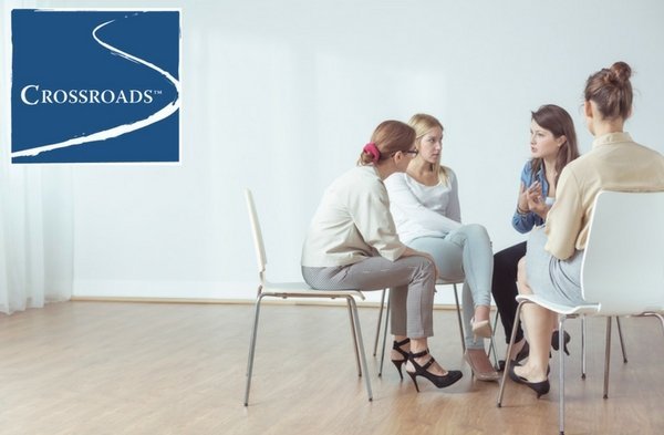 women's group therapy discussing their addiction recovery