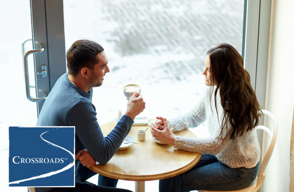 Couple talking over Coffee to rebuild their trust in each other after addiction treatment