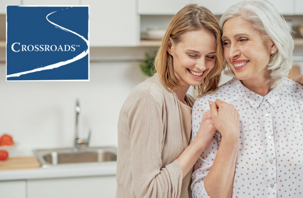 mother and adult daughter in the kitchen working together to reduce risk of addiction family history