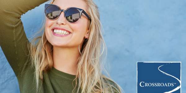 Finding Freedom in Recovery.CRBlog1 woman smiling in the sun after finding freedom in recovery