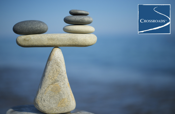 rocks balancing to represent finding balance when a loved one is in recovery