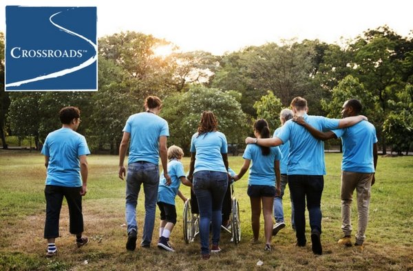 volunteer group walking together to support addiction recovery