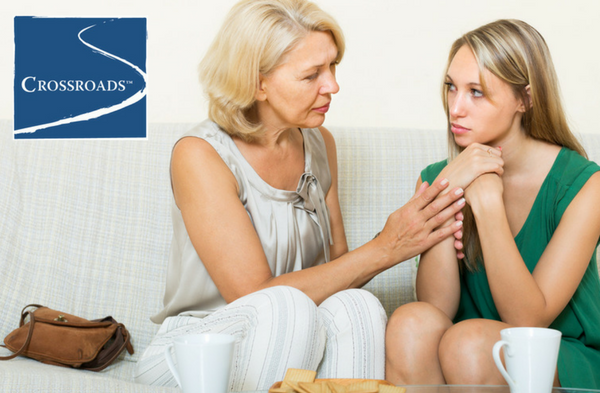 mother helping daughter with the benefits of counseling for family members during addiction recovery
