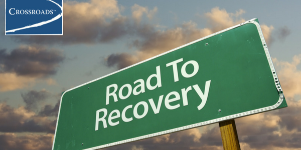 How Long Does Addiction Treatment Take_.CRBlog3 Road to Recovery sign for Crossroads