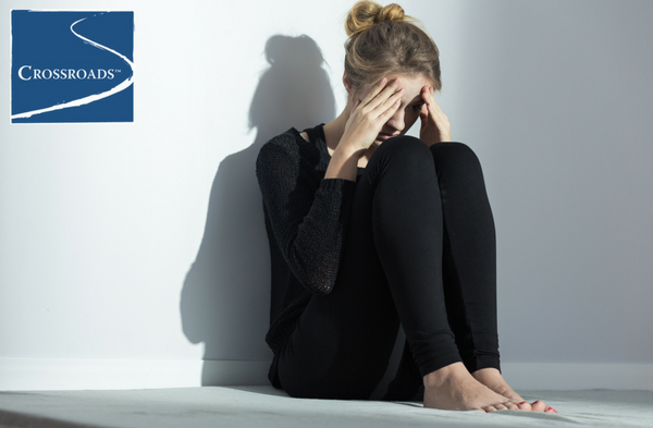 Has Your Drinking Become Problematic_.CRBlog1 woman sitting in a corner dealing with health problems from drinking alcohol