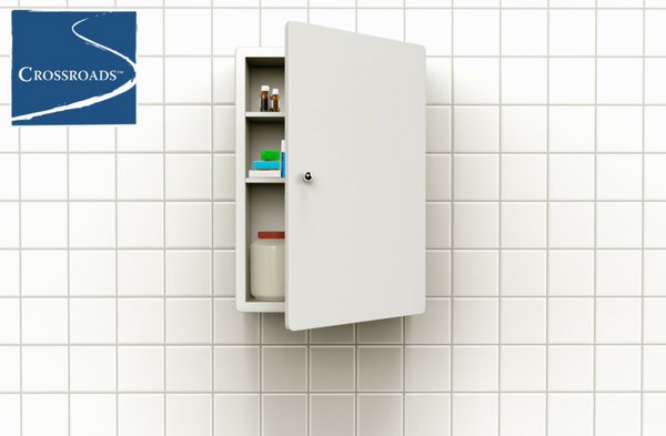 medicine cabinet ajar in bathroom