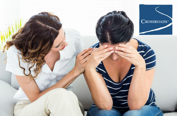 woman consoling her wife to stop blaming herself