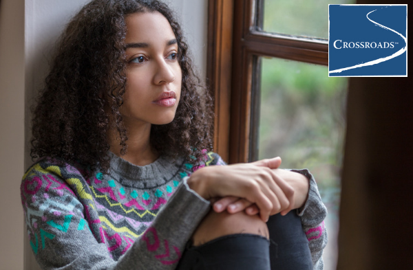Fighting Back Against Depression.CRBlog2 teen girl sitting depressed by window because of avoidant and restrictive food intake disorder