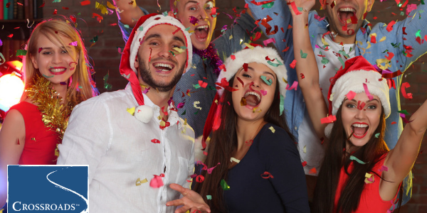 Socializing in Recovery_ Avoiding Holiday Temptation.CRBlog3 smiling family members at holiday party becoming a stressor in recovery