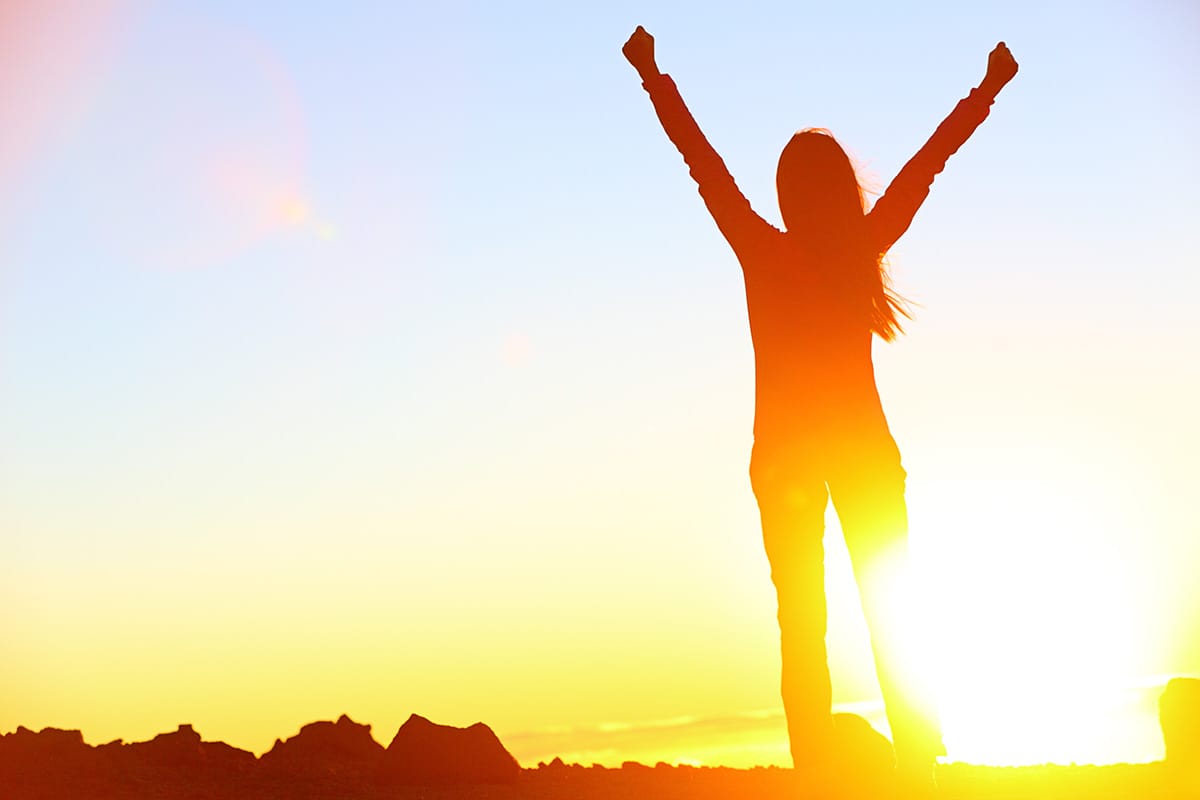 a woman experiences the benefits of sobriety in the new year
