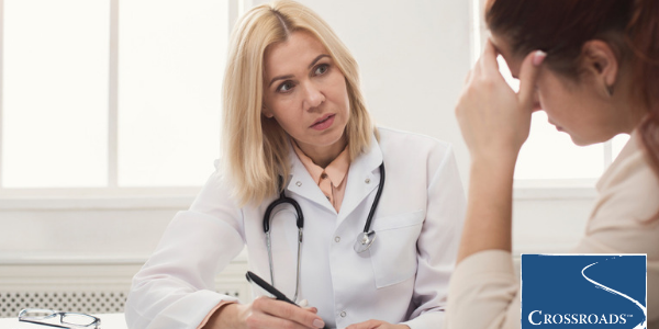 doctor consulting patient with eating disorder relapse