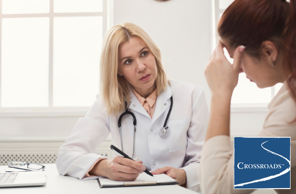 doctor consulting patient with eating disorder relapse