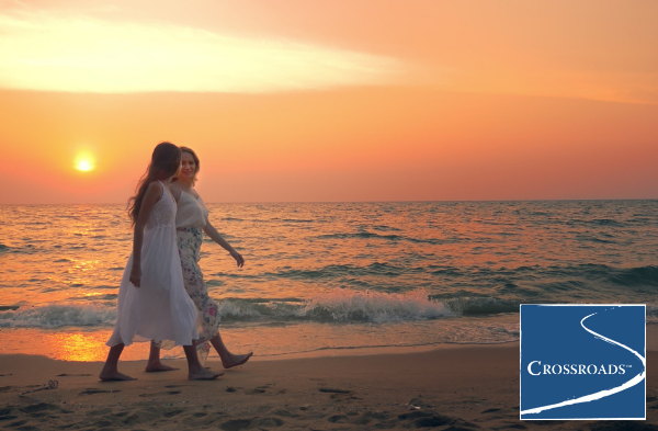 Finding the Right Drug and Alcohol Treatment Center.CRBlog1 two women strolling down the beach at sunset discussing the right drug and alcohol treatment center