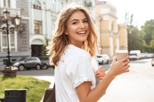 woman staying connected to Crossroads Maine Treatment Center on her way to work