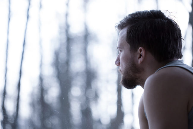 pensive man thinking about addiction and physical health