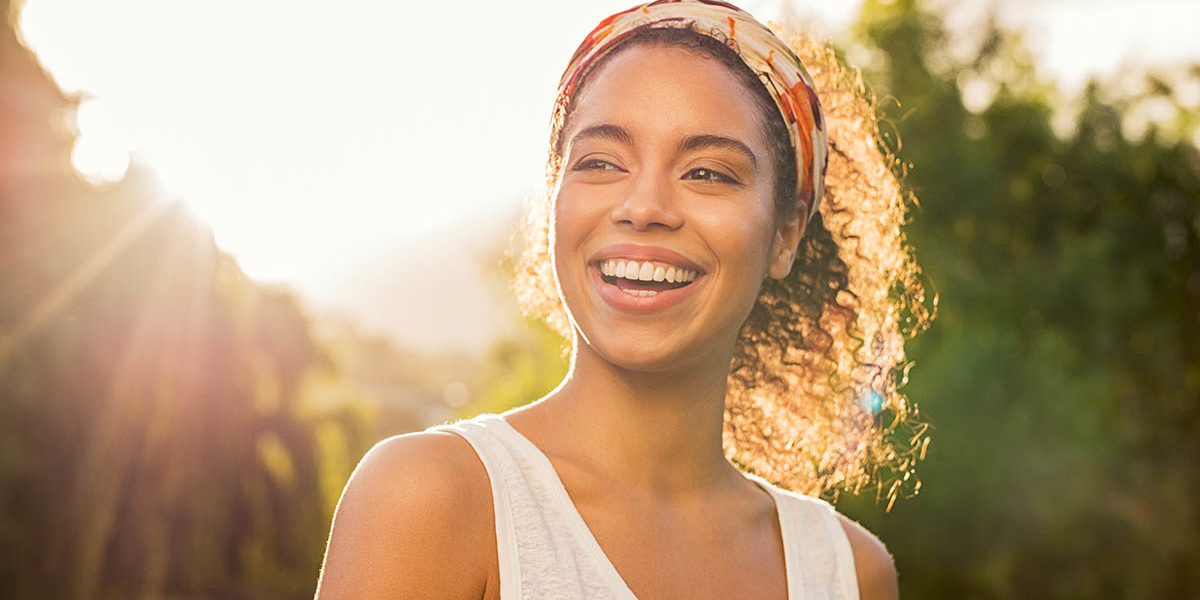 happy woman after learning about the different eating disorders and finding help