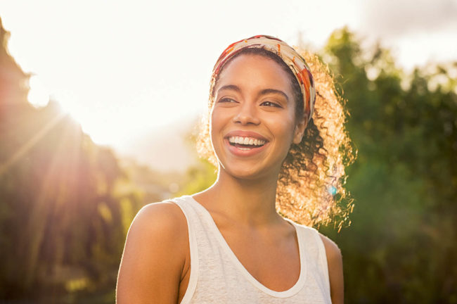 different eating disorders happy woman after learning about the different eating disorders and finding help