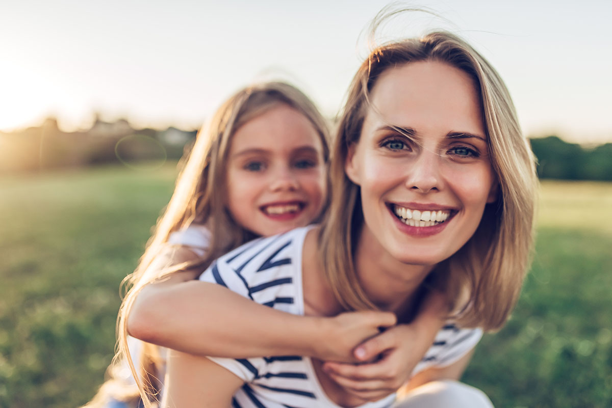 stress and addiction woman and daughter happy after mom learns how to manage her stress and addiction