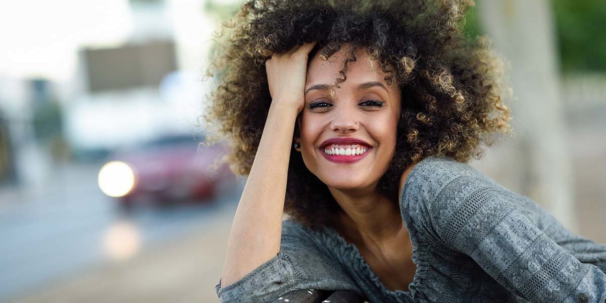 national recovery month happy woman smiling celebrating national recovery month