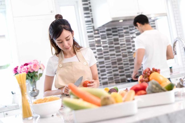 a woman thinks about creating a healthy food relationship