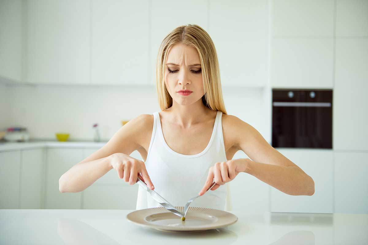 woman struggling with eating disorders and addiction