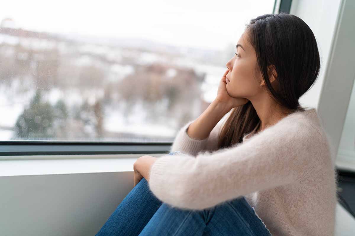 a woman struggles with secondary trauma