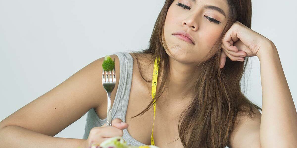 eating-disorders Young Woman Experiencing An Eating Disorder