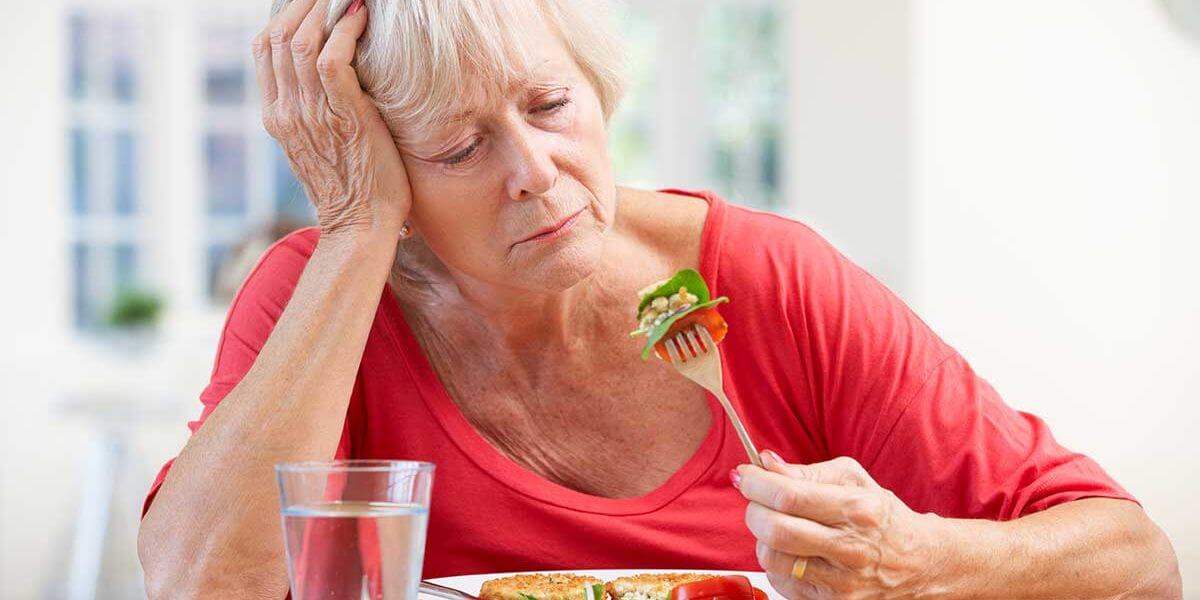 1-3-Signs-of-an-Eating-Disorder-Relapse a woman struggles with eating disorder relapse signs