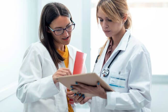 a pair discusses alcohol treatment for professionals