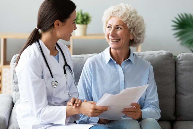 6-What-You-Should-Know-About-Paying-for-Treatment a doctor goes over the cost of addiction treatment