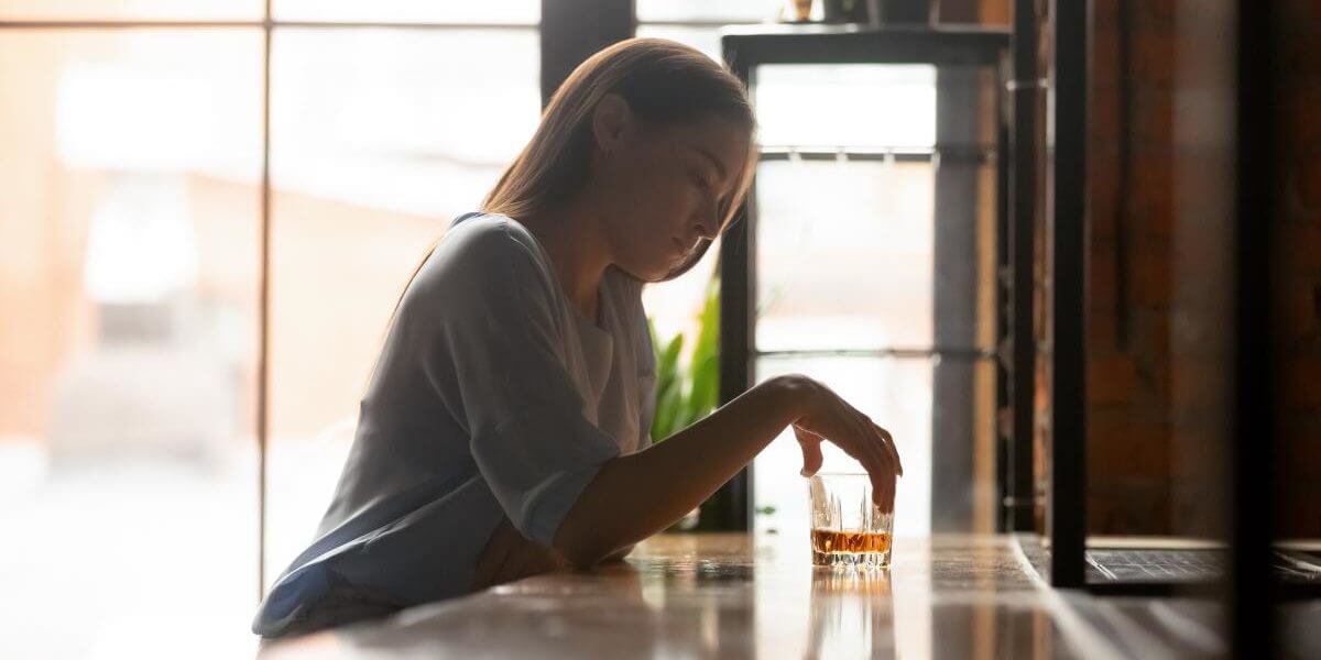 Medical complications for women with alcohol use disorders a woman suffers from complications associated with alcohol addiction