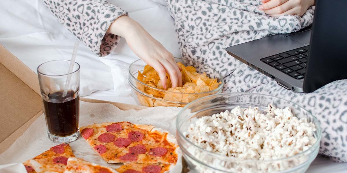 a woman struggles with the effects of binge eating disorder