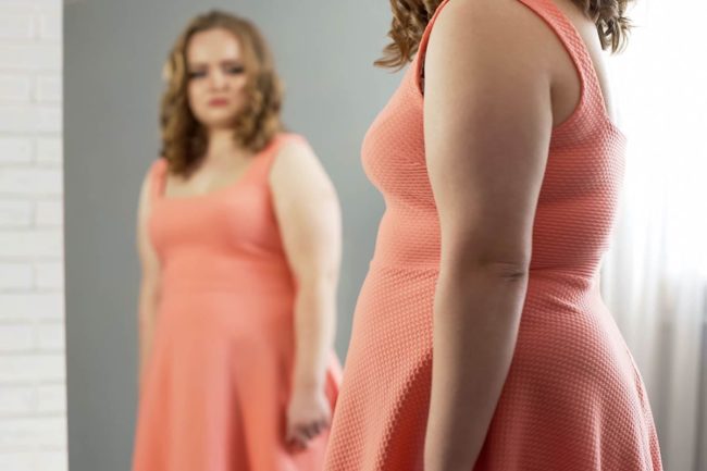 a woman wants to learn facts about eating disorders