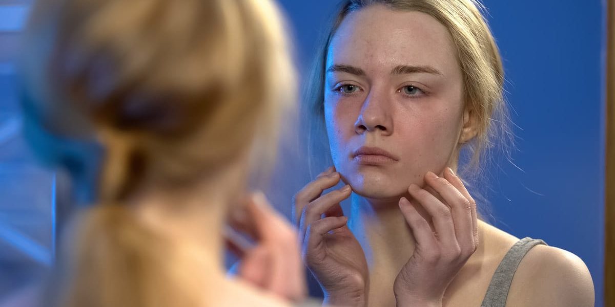 How to Support Women on National Eating Disorders Awareness Week a woman looks for support on national eating disorders awareness week