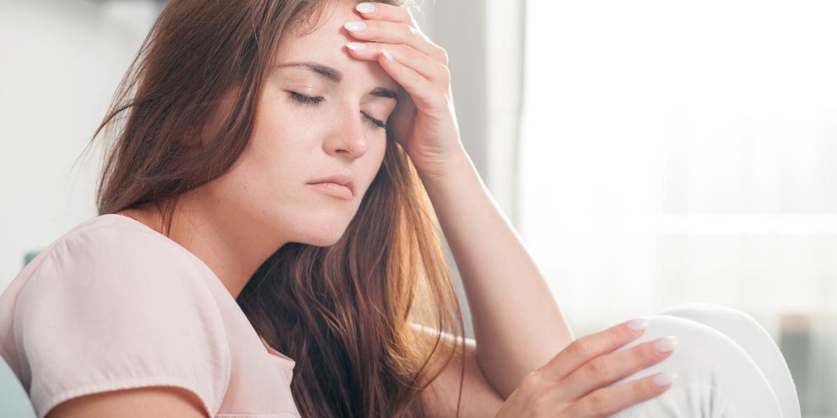 The Dangers of Stimulants Like Adderall a woman struggles with the dangers of stimulants