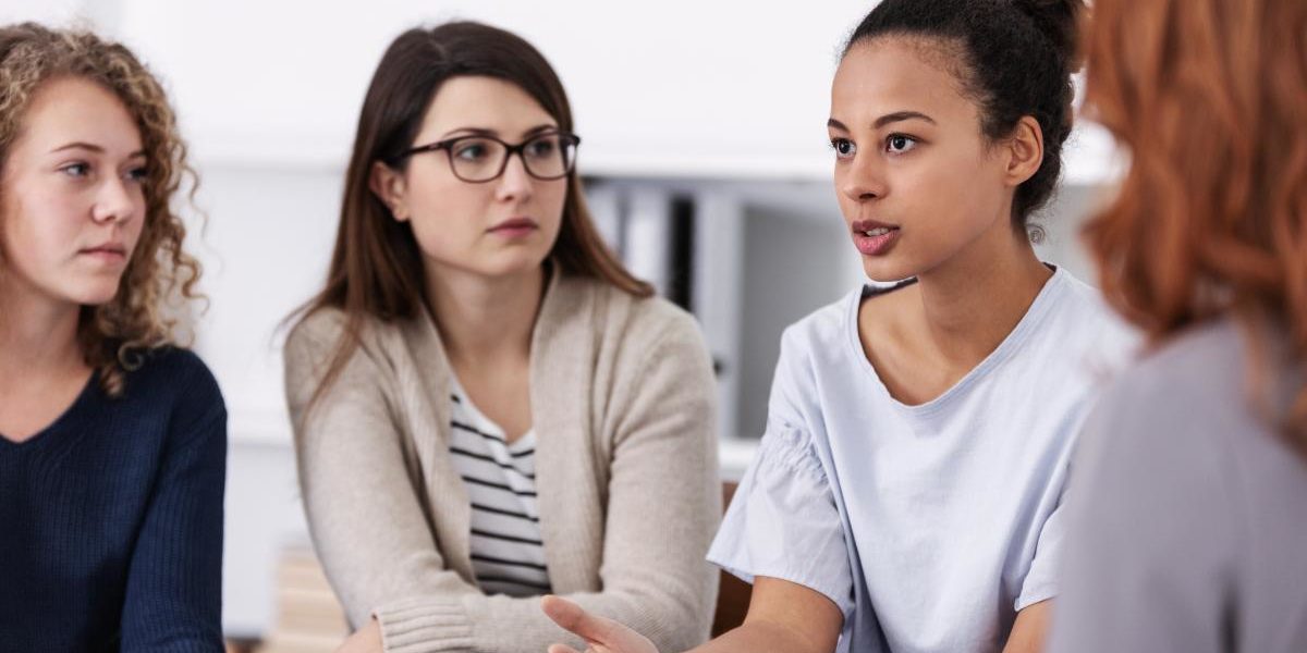 a group of women talking about their cocaine addiction treatment